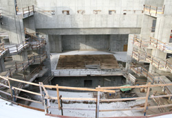 Stage with trap platform opening